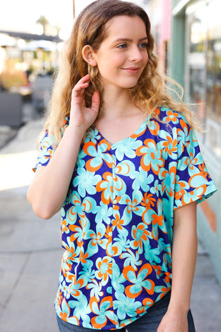 Blue & Orange Flat Floral V Neck Top (SMALL left)