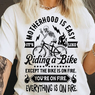 Motherhood Is Easy It's Like Riding A Bike Except The Bike Is On Fire You're On Fire T-Shirt or Crew Sweatshirt